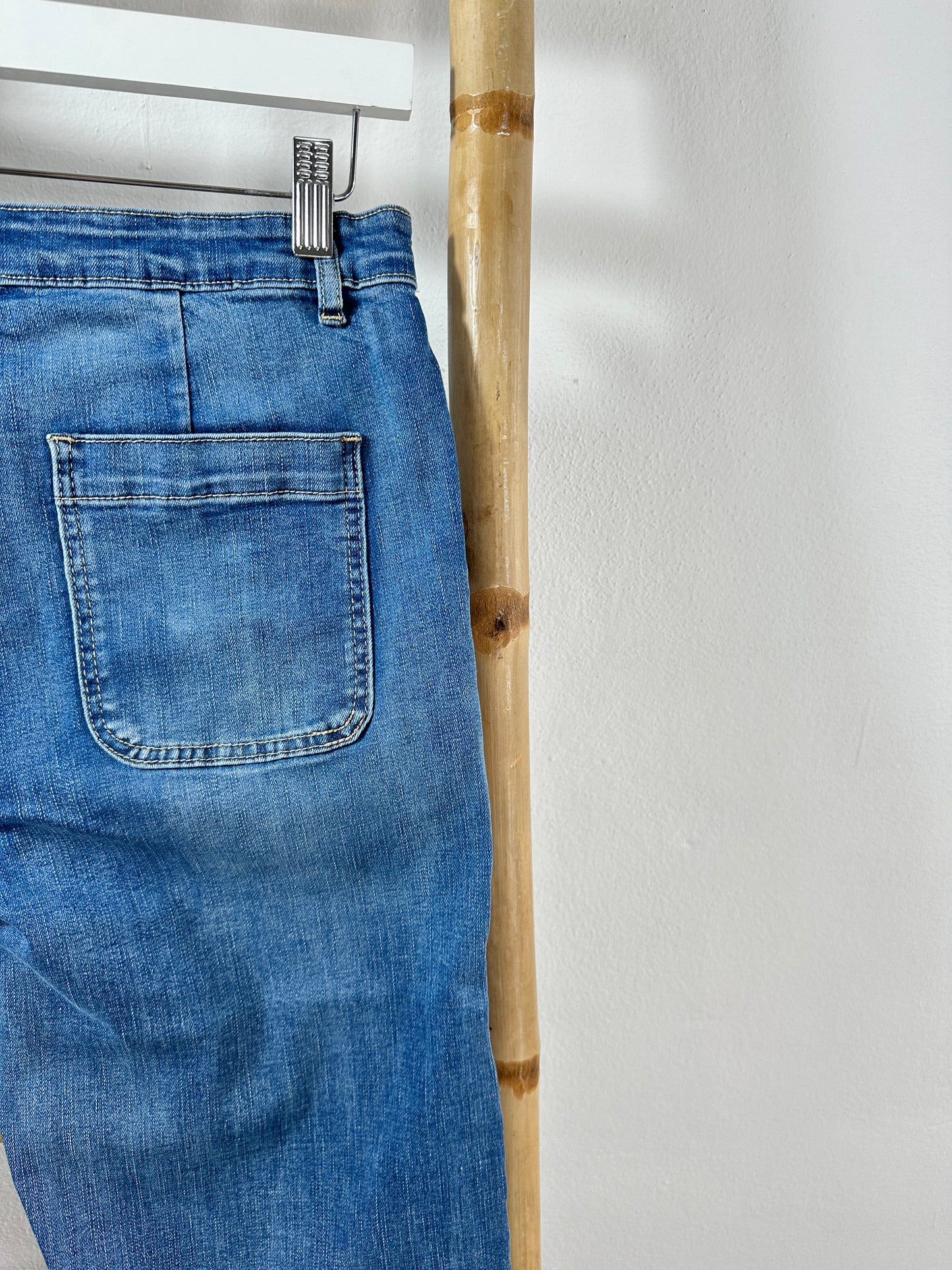 BELL-FLATED DENIM PANTS WITH BUTTONS