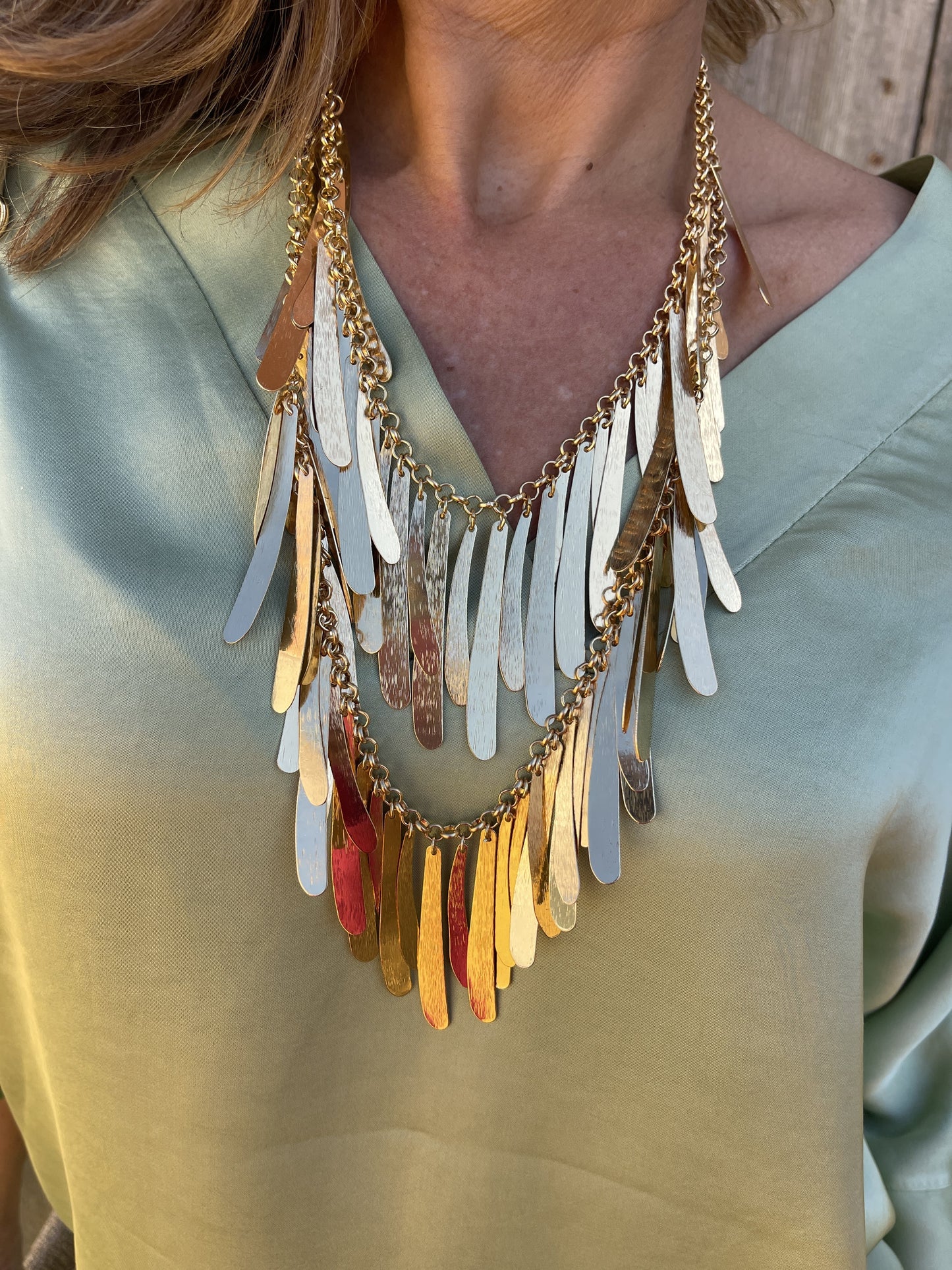 COLLAR PLUMA DORADO
