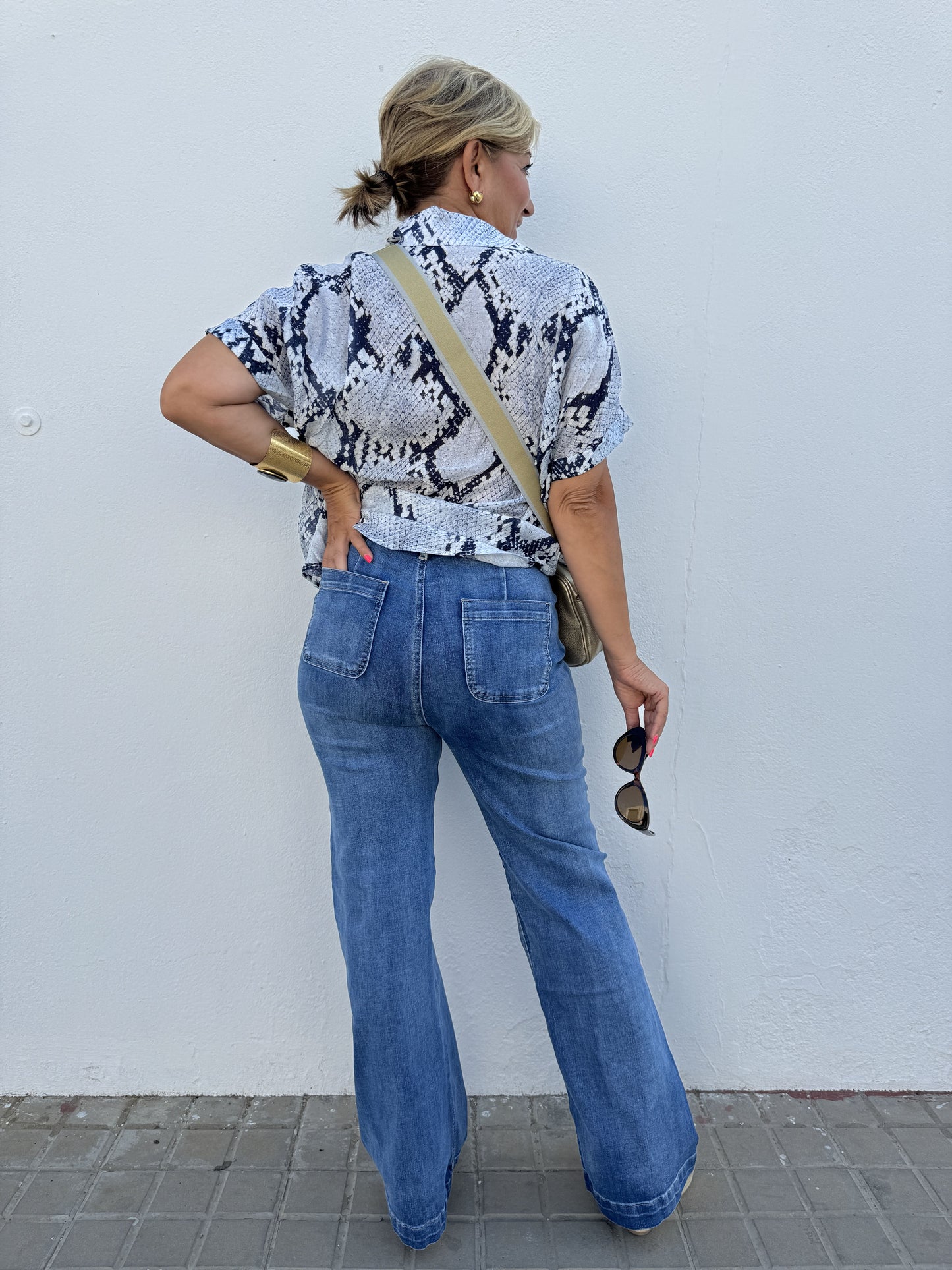BELL-FLATED DENIM PANTS WITH BUTTONS