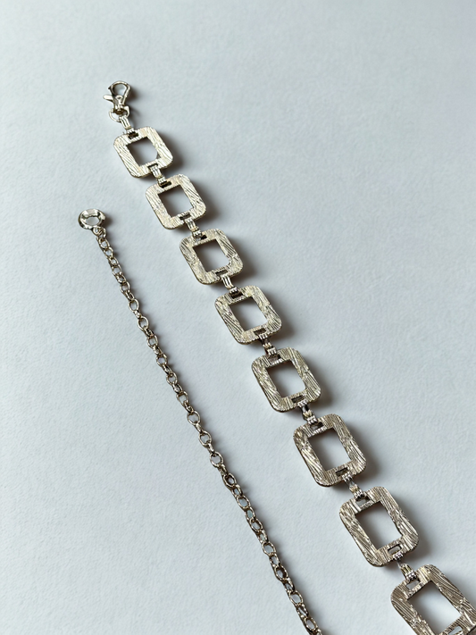 CINTURÓN METALIZADO GEOMÉTRICO