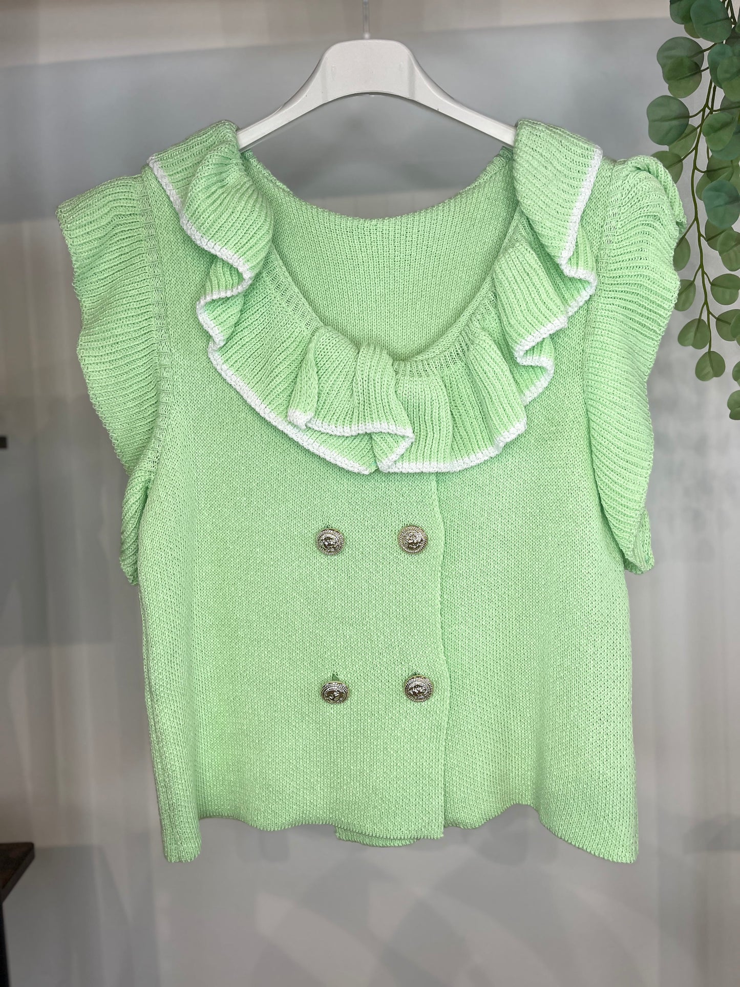 JERSEY SIN MANGA ABOTONADO