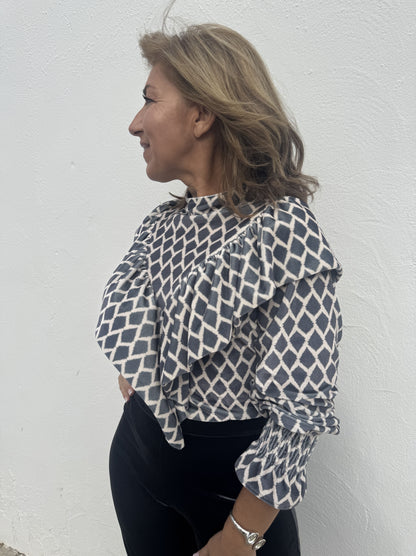 BLUSA TERCIOPELO VOLANTES